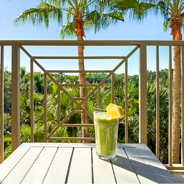 Smoothie on a Deck with Palm Trees in the Background